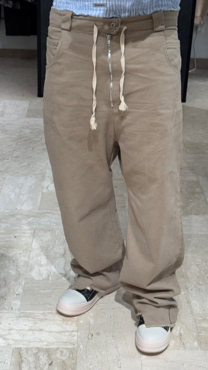PANTALACCIO BEIGE CON ROTTURE SUL FONDO